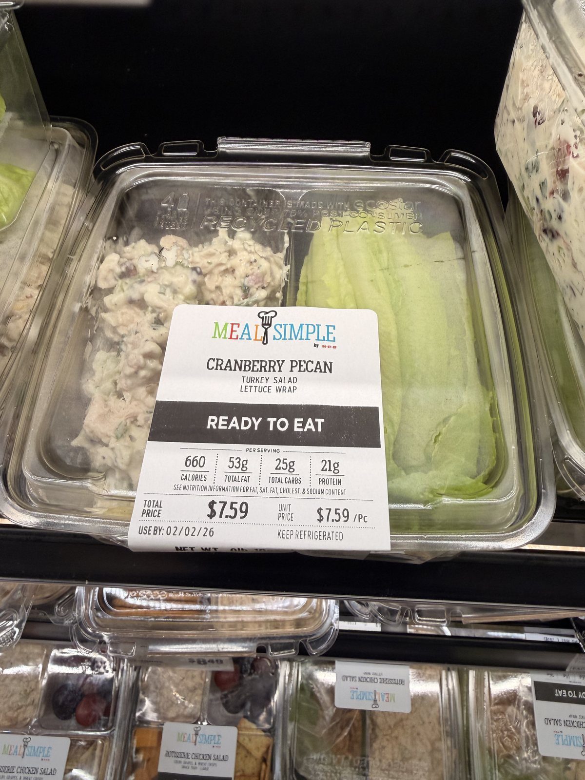 An H-E-B Meal Simple cranberry pecan turkey salad lettuce wrap, labeled 21g of protein, $7.59