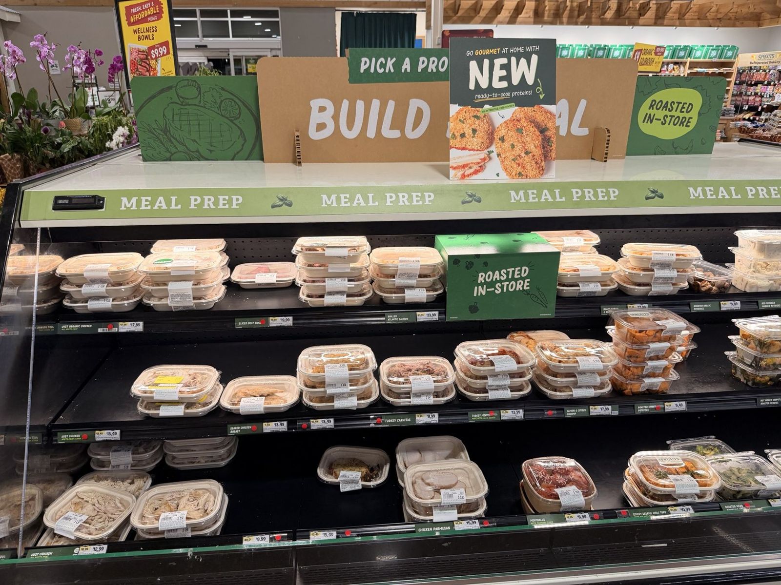 Sprouts Farmers Market meal-prep case under Build a meal and Pick a protein signs